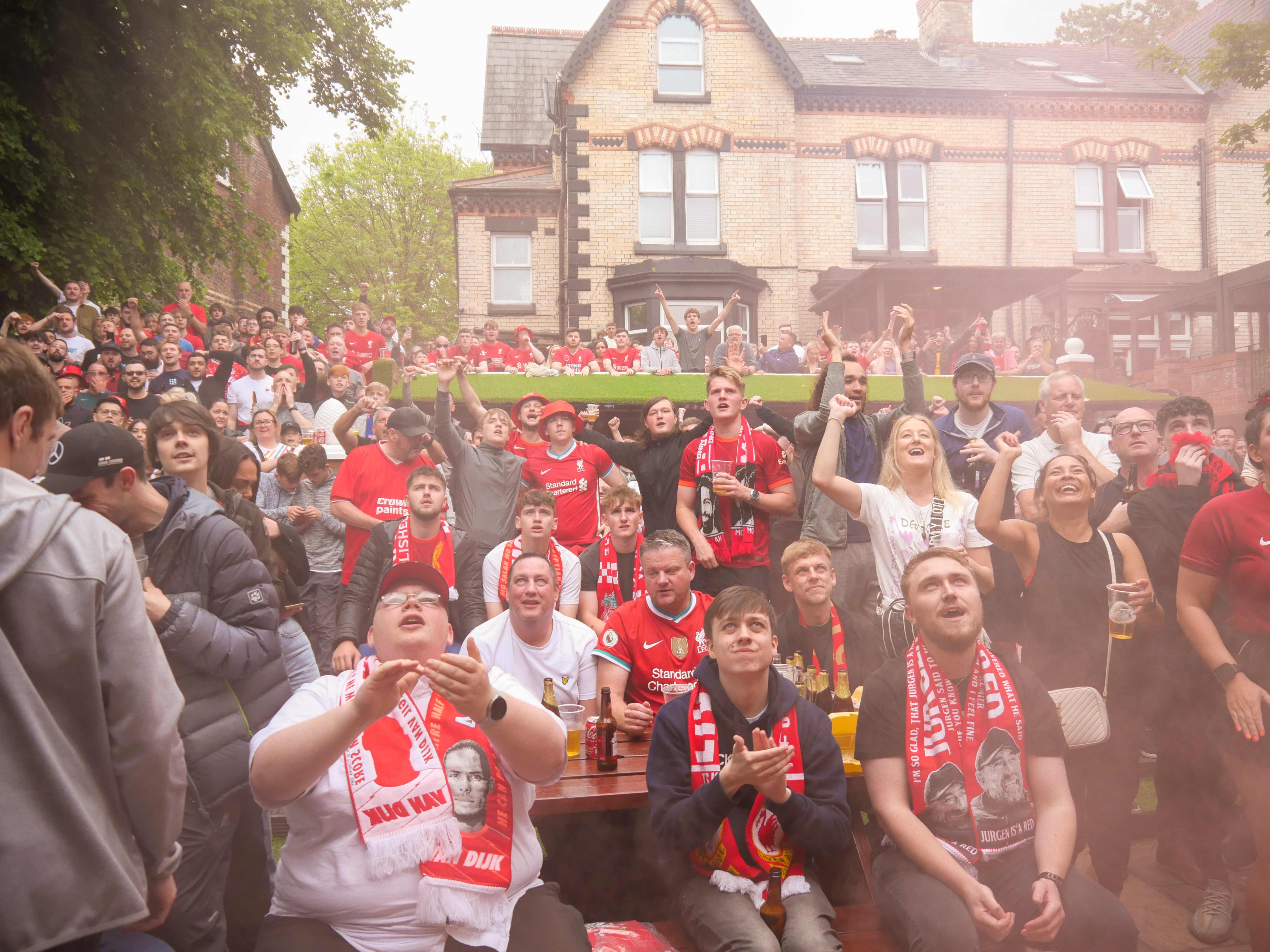 Liverpool fans celebrating at Hotel Anfield
